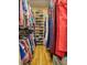 Walk-in closet with shelving featuring an organized collection of clothes and shoes at 2817 Buckboard Ln, Raleigh, NC 27603