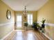 Inviting dining room with hardwood floors and a classic chandelier at 2817 Buckboard Ln, Raleigh, NC 27603