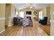 Spacious living room showcasing hardwood floors, comfortable seating, and a fireplace, perfect for gathering at 2817 Buckboard Ln, Raleigh, NC 27603