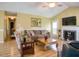 Bright living room with hardwood floors, comfortable seating, and a fireplace, creating a cozy atmosphere at 2817 Buckboard Ln, Raleigh, NC 27603