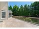 The backyard of this home features a wooden deck and lush landscaping, making it a private oasis at 307 Beacon Falls Ct, Cary, NC 27519