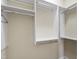 Walk-in closet featuring custom shelving at 307 Beacon Falls Ct, Cary, NC 27519