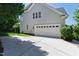 This home boasts a two-car garage and a large driveway for ample parking at 307 Beacon Falls Ct, Cary, NC 27519