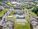Aerial view of the community pool, playground, tennis court, and amenities at 333 Amber Acorn Ave, Raleigh, NC 27603