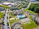 Community aerial view showcasing pool, playground, tennis court, and amenities at 333 Amber Acorn Ave, Raleigh, NC 27603