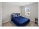 Calm bedroom with plush bedding and bright window offering relaxing space and natural light at 333 Amber Acorn Ave, Raleigh, NC 27603