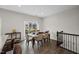 Well-lit dining area with large windows and modern decor that is perfect for entertaining guests at 333 Amber Acorn Ave, Raleigh, NC 27603