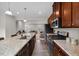 Modern kitchen with stainless appliances and sightlines to living room at 333 Amber Acorn Ave, Raleigh, NC 27603