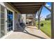 Outdoor patio with swing and view of lawn at 333 Amber Acorn Ave, Raleigh, NC 27603
