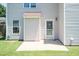Exterior features a covered patio and secure white-framed door with a white security screen door at 4125 Scofield Dr, Raleigh, NC 27610