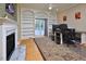 Office with a fireplace, built-in bookshelves, and a large desk area at 4219 Peachway Dr, Durham, NC 27705