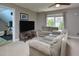 Comfortable living room with neutral carpet, a ceiling fan, and lots of seating at 4219 Peachway Dr, Durham, NC 27705