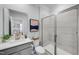 Contemporary bathroom features a glass-enclosed shower, modern vanity, and neutral tile at 43 Fountainhead Ln, Garner, NC 27529