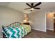 Bedroom featuring neutral walls, ceiling fan, and hardwood floors at 438 N Hickory St, Angier, NC 27501