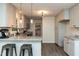 Stylish kitchen features granite counters, stainless appliances and lots of storage at 438 N Hickory St, Angier, NC 27501
