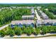 Community aerial view showcases well-maintained townhomes with lush landscaping and neighborhood streets at 4963 Highcroft Dr, Cary, NC 27519