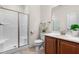 Bathroom featuring a glass shower, vanity with wooden cabinets, and neutral finishes at 4963 Highcroft Dr, Cary, NC 27519