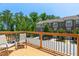 Deck with seating overlooking the street and other townhomes at 4963 Highcroft Dr, Cary, NC 27519