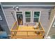 Aerial view of an elevated deck overlooking a street and other townhomes at 4963 Highcroft Dr, Cary, NC 27519