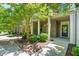 Charming front porch with brick accents and well-maintained landscaping, offering a welcoming entrance at 4963 Highcroft Dr, Cary, NC 27519