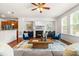 Bright living room with modern fireplace, decor, and furniture creating a cozy and inviting atmosphere at 4963 Highcroft Dr, Cary, NC 27519
