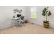 Bright office space with a sit stand desk, modern decor, large window, and comfortable ergonomic chair at 4963 Highcroft Dr, Cary, NC 27519