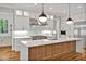 Beautiful kitchen with a spacious island, stainless appliances, and custom cabinetry at 503 Damascus Church Rd, Chapel Hill, NC 27516
