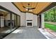 Covered patio with skylight, wood ceiling, fireplace and access to backyard at 503 Damascus Church Rd, Chapel Hill, NC 27516