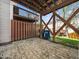 Small backyard space featuring gravel, a fence, and a view of the deck above at 5505 Crabtree Park Ct, Raleigh, NC 27612