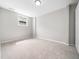 Bedroom featuring a window that offers natural light and closet for storage at 5505 Crabtree Park Ct, Raleigh, NC 27612