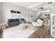 Bright living room featuring hardwood floors and a neutral color palette at 5505 Crabtree Park Ct, Raleigh, NC 27612