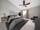 Main bedroom with ceiling fan, carpet flooring, and plenty of natural light at 5505 Crabtree Park Ct, Raleigh, NC 27612