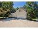 Spacious two-car garage with a clean, modern door and ample driveway parking at 5940 Dahlberg Dr, Raleigh, NC 27603