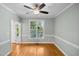 Open floor plan living room with hardwood floors and natural light at 5940 Dahlberg Dr, Raleigh, NC 27603
