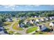 Aerial view of suburban houses, with well-manicured lawns on a sunny day at 614 Marian Way, Sanford, NC 27330