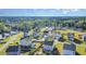 A beautiful aerial view of a suburban neighborhood nestled amidst lush greenery and trees at 614 Marian Way, Sanford, NC 27330