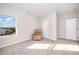 Bedroom featuring plush carpet and a beige armchair with a window for lots of natural light at 614 Marian Way, Sanford, NC 27330
