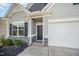 Charming single-Gathering home with a well-manicured lawn and attached two-car garage at 614 Marian Way, Sanford, NC 27330