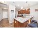 Modern kitchen features a large island with granite countertops and stainless steel appliances at 614 Marian Way, Sanford, NC 27330