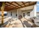Covered back patio that is partially covered, offering space to entertain guests or relax outdoors at 614 Marian Way, Sanford, NC 27330