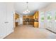 Large kitchen with wood cabinets, stainless steel appliances, and tile flooring throughout at 63 Majestic Oak Dr, Garner, NC 27529