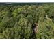 Panoramic aerial view of the forest, with the home partially visible at 6700 Falconbridge Rd, Chapel Hill, NC 27517
