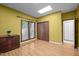 Bright bedroom featuring wood floors, a skylight, large closet and a window providing natural light at 6700 Falconbridge Rd, Chapel Hill, NC 27517