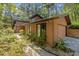 Exterior view showcasing the architectural style and surrounding landscaping at 6700 Falconbridge Rd, Chapel Hill, NC 27517