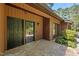 Home's front entrance with a stone walkway and mature landscaping at 6700 Falconbridge Rd, Chapel Hill, NC 27517