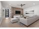 Bright living room with modern decor and stylish wood slat wall at 730 Hopkins St, Durham, NC 27701