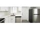 Updated kitchen with stainless steel dishwasher and fridge and convenient access to the back door at 800 Pritchard Avenue Ext # H9, Chapel Hill, NC 27516
