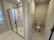 Bathroom with a walk-in shower and toilet at 801 Portland Rose Dr, Knightdale, NC 27545