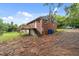 The backyard features a deck with convenient access and a spacious area at 807 New St, Graham, NC 27253