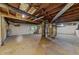 Unfinished basement area with concrete floors, ready for customization or storage solutions at 807 New St, Graham, NC 27253